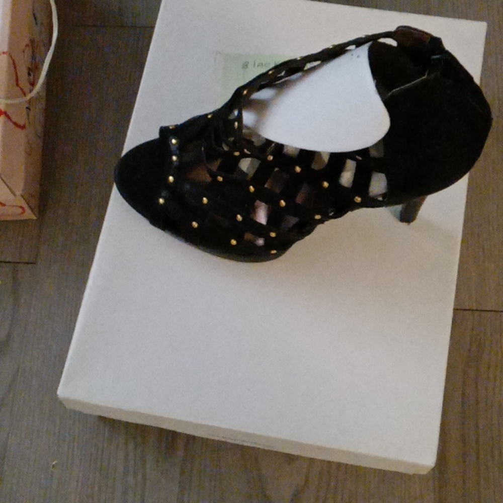 Black and gold zip up boots